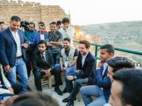Crown Prince meets young volunteers in Karak, joins them for iftar