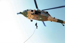 H.R.H. Crown Prince Al Hussein bin Abdullah II hangs suspended in the Jordanian skies during a military exercise– Helicopter Rope Suspension Technique Summer 2013