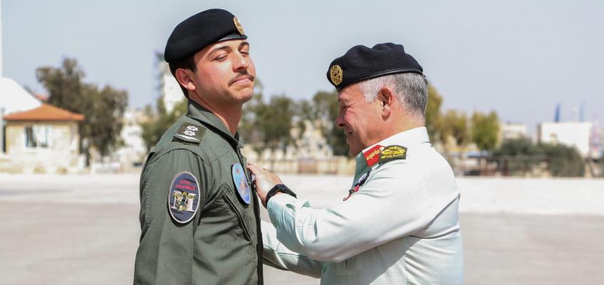 King presents Crown Prince with wings upon completing pilot training